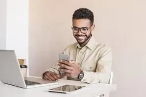 Man texting on phone